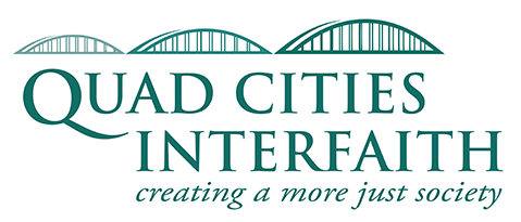 Bridge with three arches over text that reads Quad Cities Interfaith creating a more just society